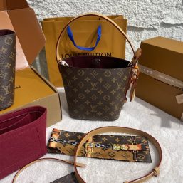 New brown Louis Vuitton pillow bag